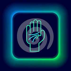 Glowing neon line Palmistry of the hand icon isolated on black background. Colorful outline concept. Vector