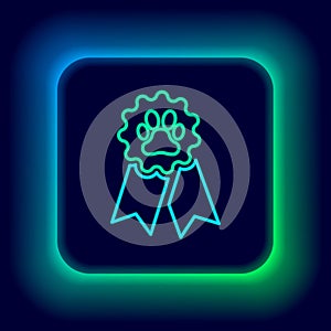 Glowing neon line Pet award symbol icon isolated on black background. Badge with dog or cat paw print and ribbons. Medal