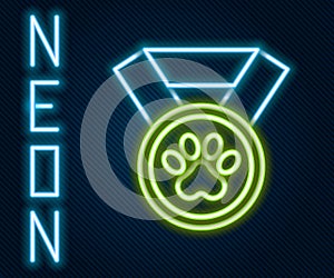 Glowing neon line Pet award symbol icon isolated on black background. Badge with dog or cat paw print and ribbons. Medal