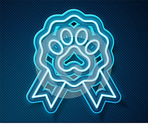 Glowing neon line Pet award symbol icon isolated on blue background. Badge with dog or cat paw print and ribbons. Medal