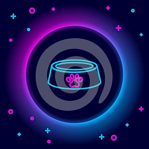 Glowing neon line Pet food bowl for cat or dog icon isolated on black background. Dog or cat paw print. Colorful outline