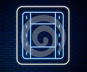 Glowing neon line Play Video icon isolated on brick wall background. Film strip sign. Vector