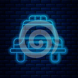 Glowing neon line Police car and police flasher icon isolated on brick wall background. Emergency flashing siren. Vector