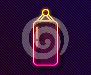 Glowing neon line Punching bag icon isolated on black background. Vector
