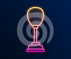 Glowing neon line Punching bag icon isolated on black background. Vector