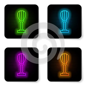 Glowing neon line Punching bag icon isolated on white background. Black square button. Vector