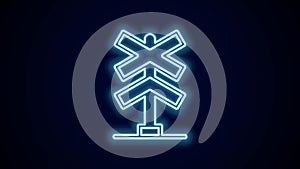 Glowing neon line Railroad crossing icon isolated on black background. Railway sign. 4K Video motion graphic animation