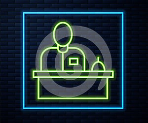 Glowing neon line Receptionist standing at hotel reception desk icon isolated on brick wall background. Vector