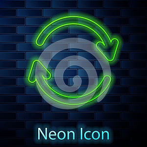 Glowing neon line Refresh icon isolated on brick wall background. Reload symbol. Rotation arrows in a circle sign