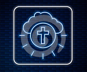 Glowing neon line Religious cross in the circle icon isolated on brick wall background. Love of God, Catholic and