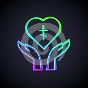 Glowing neon line Religious cross in the heart inside icon isolated on black background. Love of God, Catholic and