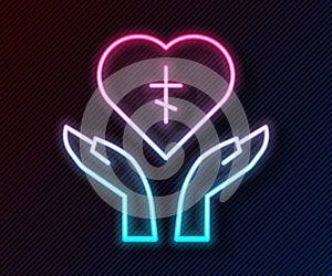 Glowing neon line Religious cross in the heart inside icon isolated on black background. Love of God, Catholic and