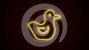 Glowing neon line Rubber duck icon isolated on black background. 4K Video motion graphic animation