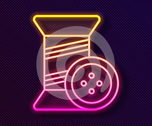 Glowing neon line Sewing thread on spool and button icon isolated on black background. Yarn spool. Thread bobbin. Vector