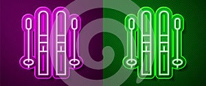 Glowing neon line Ski and sticks icon isolated on purple and green background. Extreme sport. Skiing equipment. Winter
