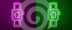 Glowing neon line Smart home with smart watch icon isolated on purple and green background. Remote control. Vector