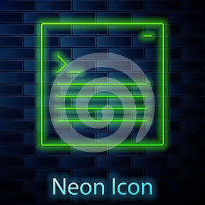 Glowing neon line Software, web developer programming code icon isolated on brick wall background. Javascript computer