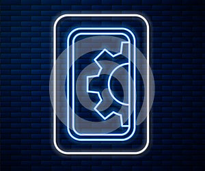 Glowing neon line Software, web development, programming concept icon isolated on brick wall background. Programming