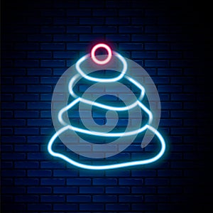 Glowing neon line Stack hot stones icon isolated on brick wall background. Spa salon accessory. Colorful outline concept