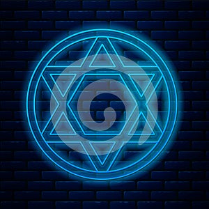Glowing neon line Star of David icon isolated on brick wall background. Jewish religion symbol. Symbol of Israel. Vector