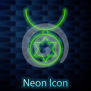 Glowing neon line Star of David necklace on chain icon isolated on brick wall background. Jewish religion. Symbol of