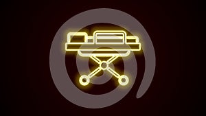 Glowing neon line Stretcher icon isolated on black background. Patient hospital medical stretcher. 4K Video motion