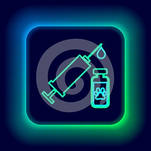 Glowing neon line Syringe with pet vaccine icon isolated on black background. Dog or cat paw print. Colorful outline