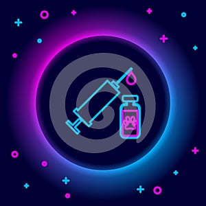 Glowing neon line Syringe with pet vaccine icon isolated on black background. Dog or cat paw print. Colorful outline