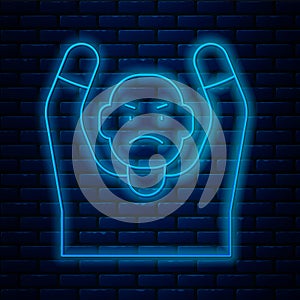 Glowing neon line Thief surrendering hands up icon isolated on brick wall background. Man surrendering with both hands