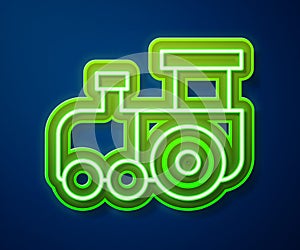 Glowing neon line Toy train icon isolated on blue background. Vector