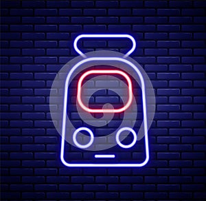 Glowing neon line Train and railway icon isolated on brick wall background. Public transportation symbol. Subway train