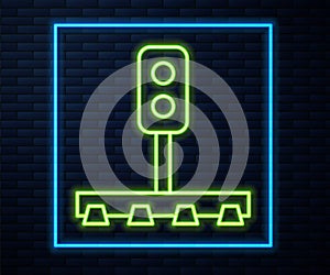 Glowing neon line Train traffic light icon isolated on brick wall background. Traffic lights for the railway to regulate