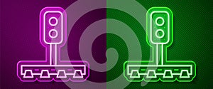 Glowing neon line Train traffic light icon isolated on purple and green background. Traffic lights for the railway to