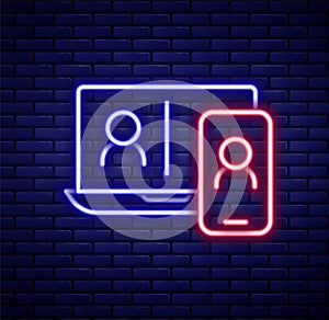 Glowing neon line Video chat conference icon isolated on brick wall background. Online meeting work form home. Remote