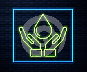 Glowing neon line Washing hands with soap icon isolated on brick wall background. Washing hands with soap to prevent