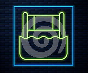 Glowing neon line Water volleyball net icon isolated on brick wall background. Vector