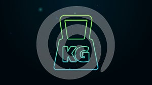 Glowing neon line Weight icon isolated on black background. Kilogram weight block for weight lifting and scale. Mass