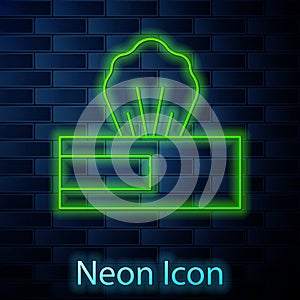 Glowing neon line Wet wipe pack icon isolated on brick wall background. Vector.