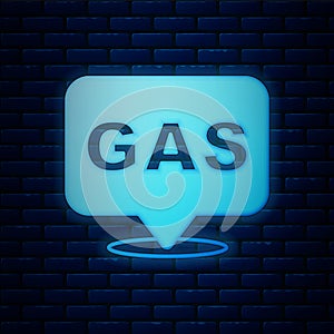 Glowing neon Location and petrol or gas station icon isolated on brick wall background. Car fuel symbol. Gasoline pump