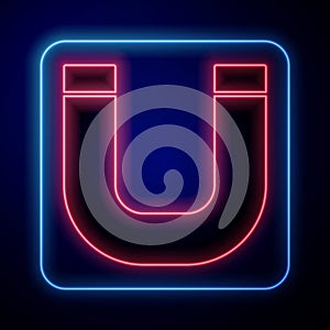 Glowing neon Magnet icon isolated on blue background. Horseshoe magnet, magnetism, magnetize, attraction. Vector