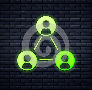Glowing neon Meeting icon isolated on brick wall background. Business team meeting, discussion concept, analysis