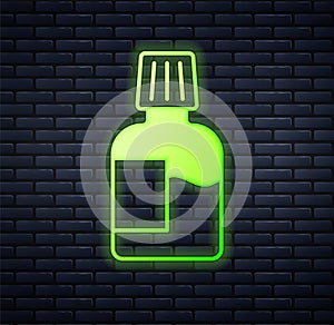 Glowing neon Mouthwash plastic bottle icon isolated on brick wall background. Liquid for rinsing mouth. Oralcare