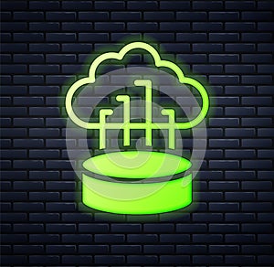 Glowing neon Network cloud connection icon isolated on brick wall background. Social technology. Cloud computing concept