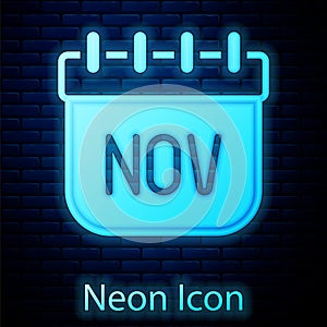 Glowing neon November calendar autumn icon isolated on brick wall background. Vector