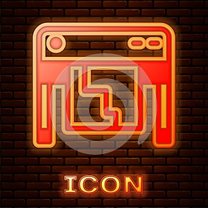 Glowing neon Plotter icon isolated on brick wall background. Large format multifunction printer. Polygraphy, printshop