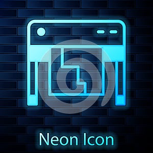 Glowing neon Plotter icon isolated on brick wall background. Large format multifunction printer. Polygraphy, printshop
