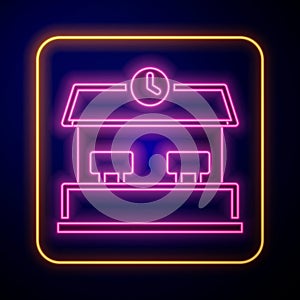 Glowing neon Railway station icon isolated on black background. Vector
