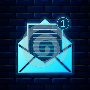 Glowing neon Received message concept. Envelope icon isolated on brick wall background. New, email incoming message, sms