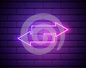 Glowing neon Refresh icon isolated on brick wall background. Reload symbol. Rotation arrows in a circle sign. Vector