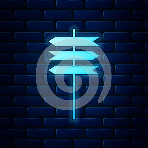 Glowing neon Road traffic sign. Signpost icon isolated on brick wall background. Pointer symbol. Blank board with place